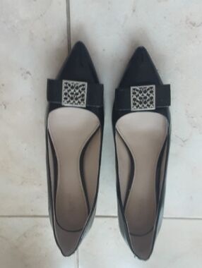 Coach Black Pointed Toe Flats with Decorative Silver Buckle